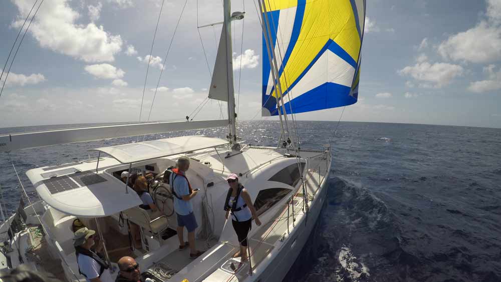 Bluewater-50-Discovery-catamaran-spinnaker-crew