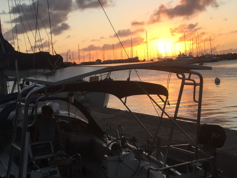 solar-panel-arch-sailboat-sunset